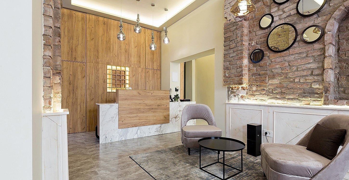 Modern lobby with stylish furniture and decor.
