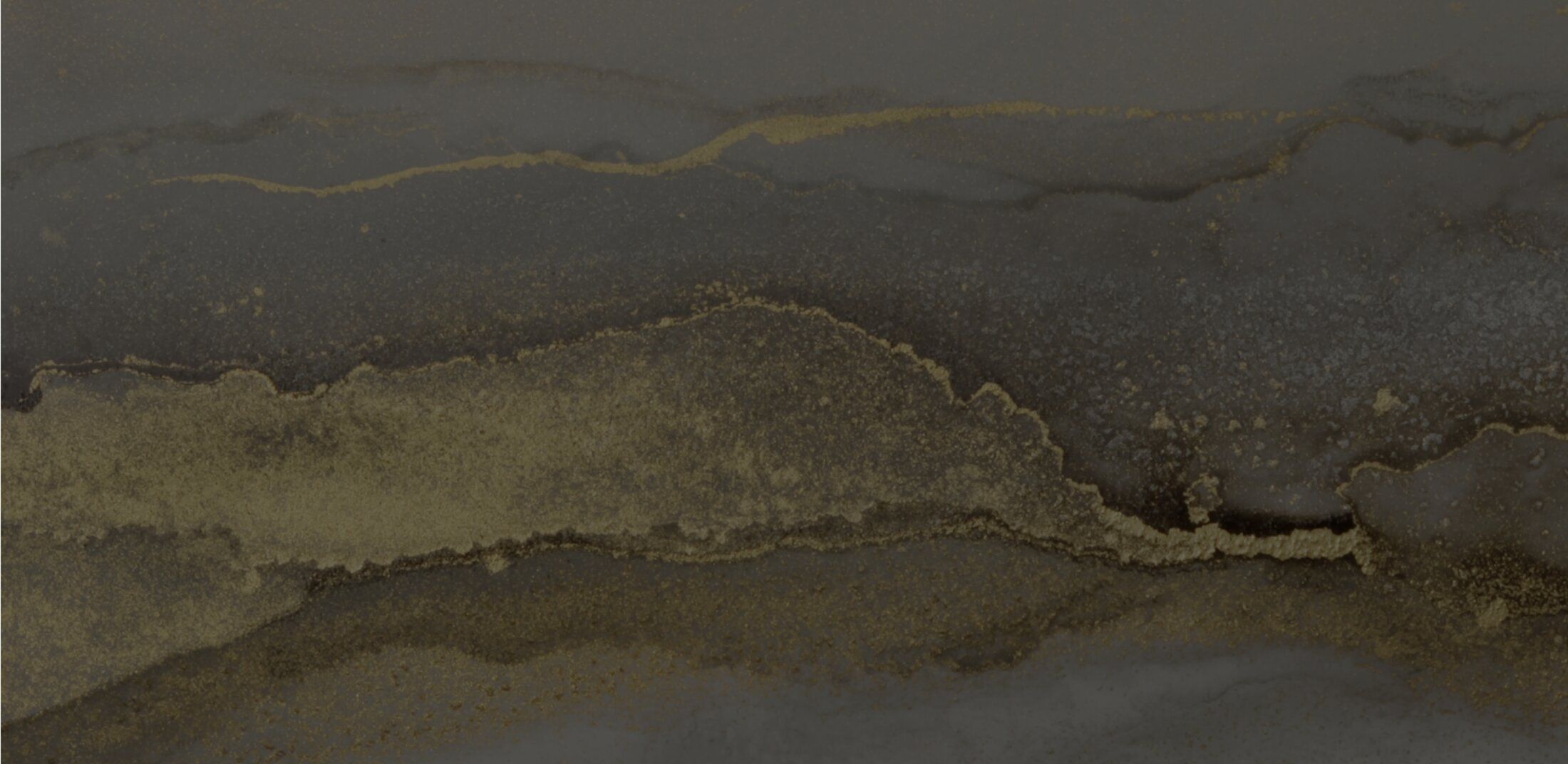 Abstract gray and gold textured background design.