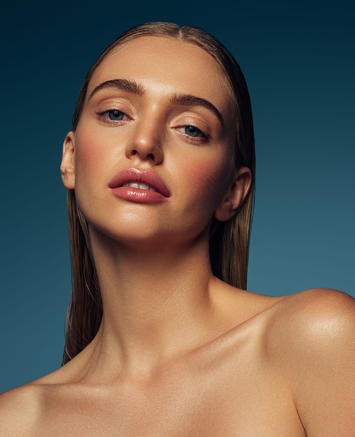 Close-up of a woman with soft makeup.
